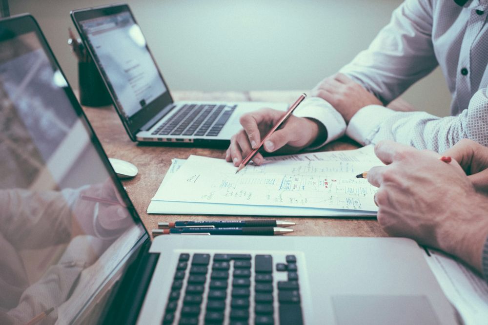 A printed funding roadmap on a desk